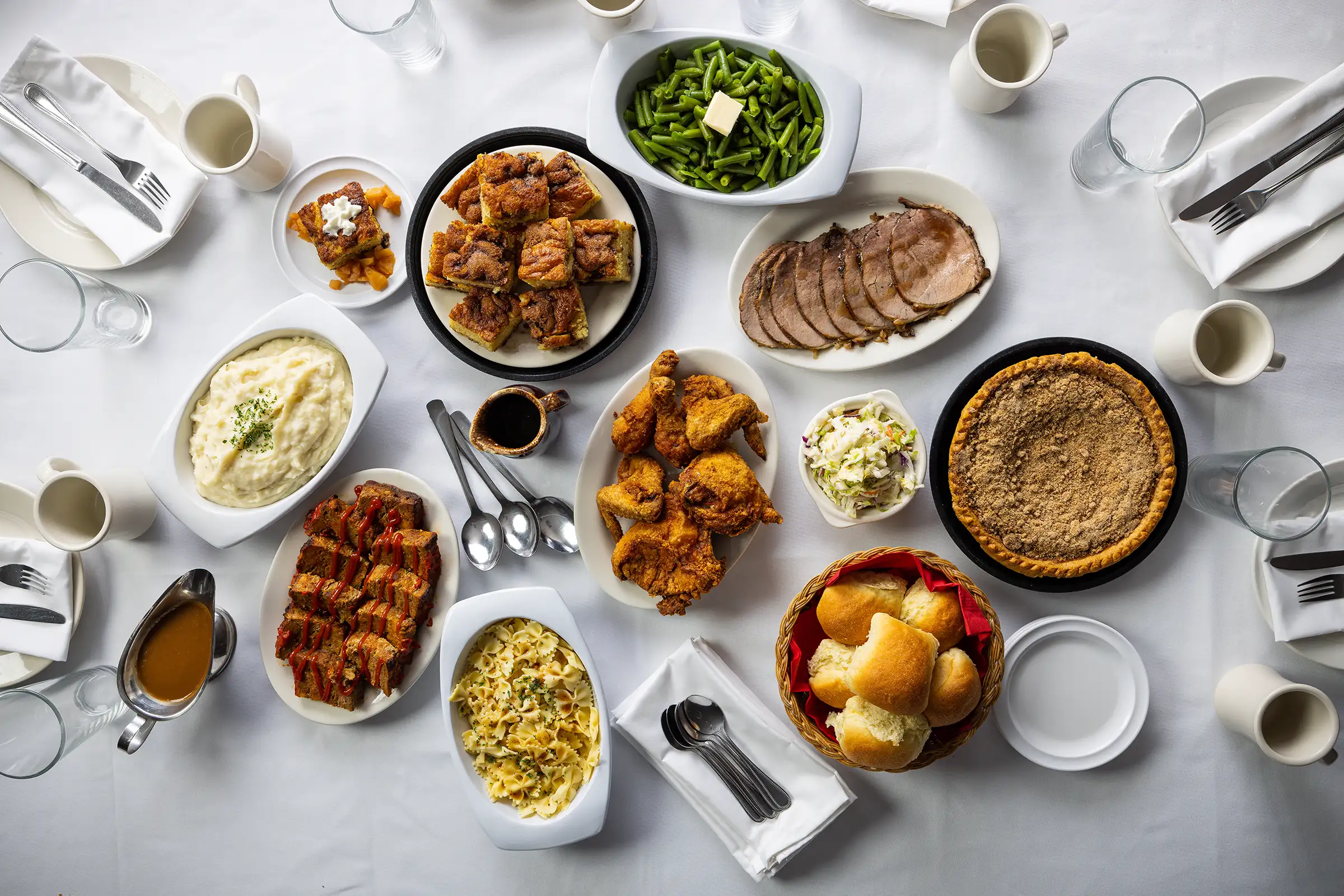 Platters of family-style food at Plain & Fancy Farm